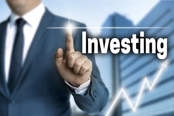 Investing touchscreen is operated by businessman — Stock Photo, Image