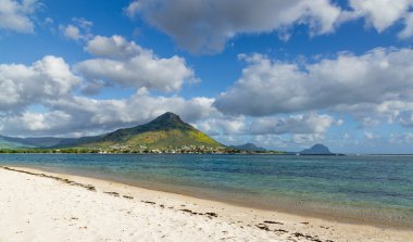 Beach of Flic en flac overlooking Tourelle du Tamarin Mauritius clipart