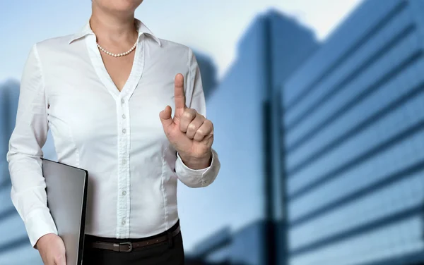 Businesswoman pointing with finger concept — Stock Photo, Image