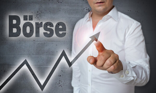 Boerse (in german stock market) touchscreen is operated by man
