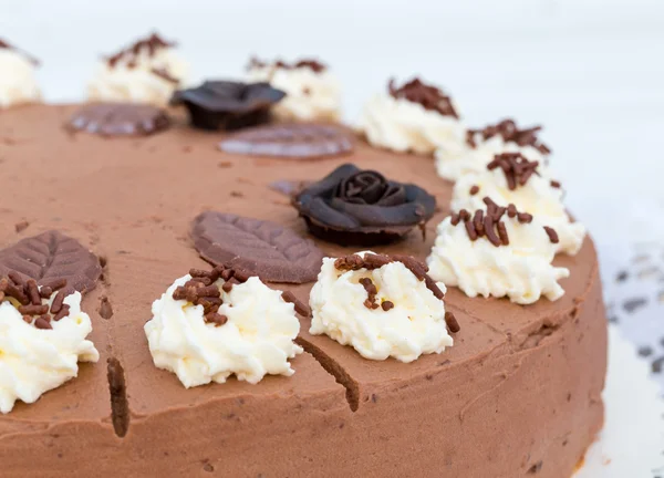 Chocolate cream cake with cake lace in detail — Stock Photo, Image