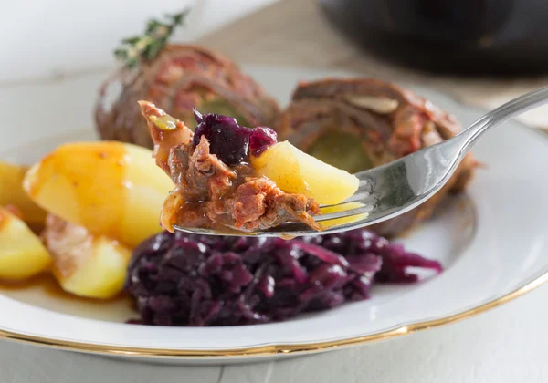 Roulade of beef with potatoes and red cabbage