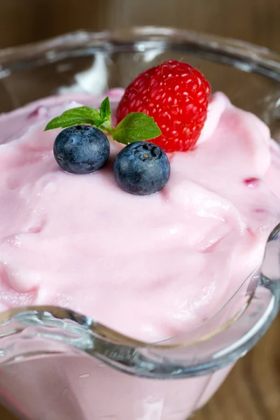 Raspberry cream dessert with mint Stock Picture