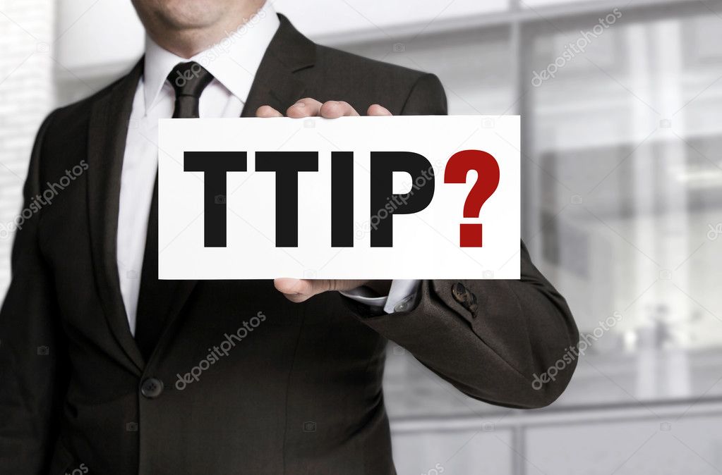 TTIP sign is held by businessman