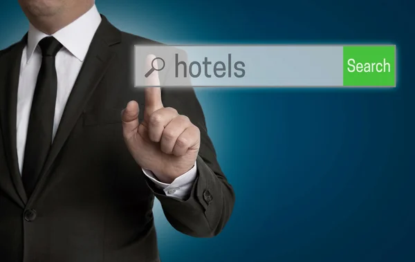 Hotel browser is operated by businessman — Stock Photo, Image