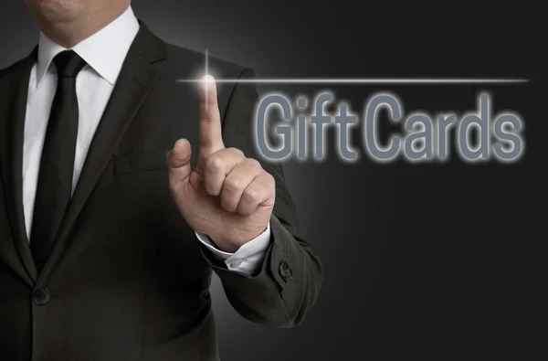 Giftcard сенсорный экран управляется бизнесменом — стоковое фото