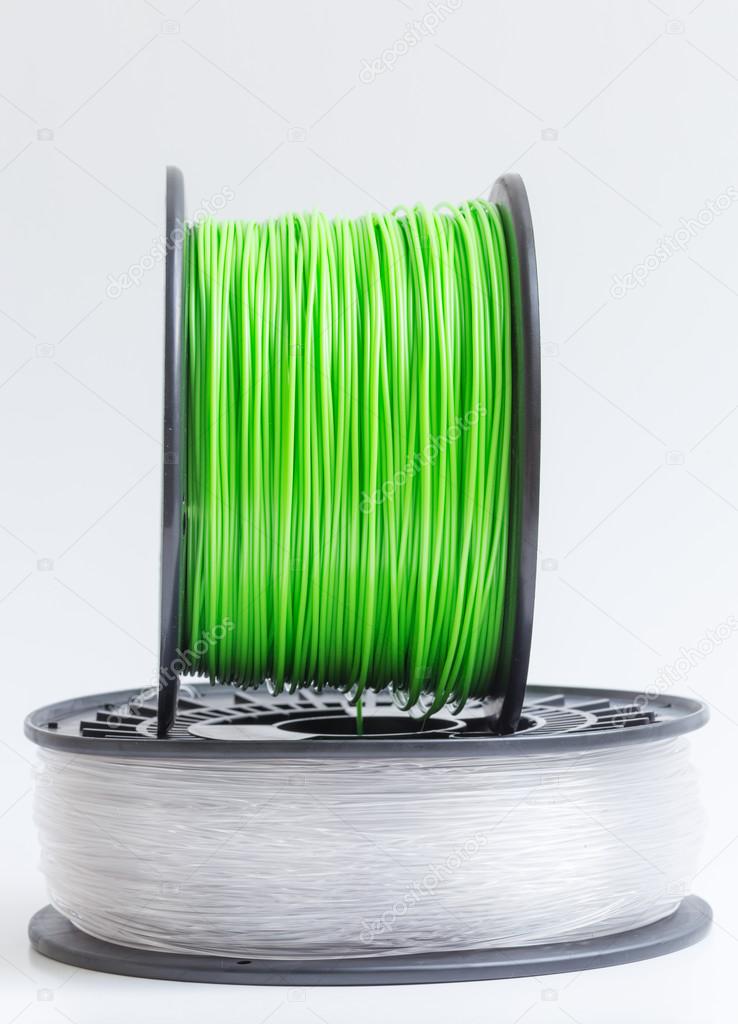 Filament for 3D Printer crystal clear and bright green against a