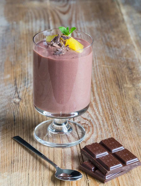 Chocolate pudding dessert with orange and grated chocolate — Stock Photo, Image