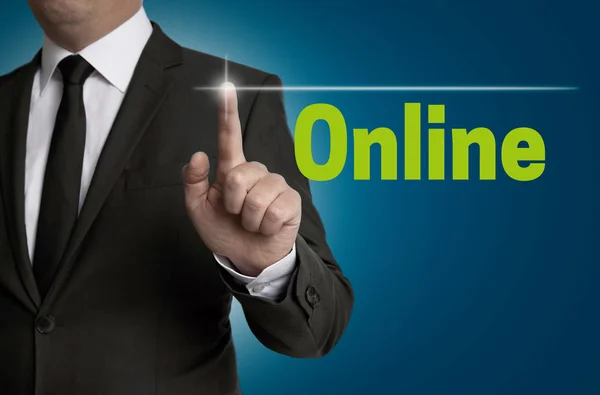 Online touchscreen is operated by businessman — Stock Photo, Image