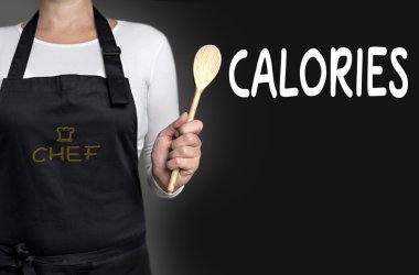 tahta kaşık arka planda tutan kalori yemek