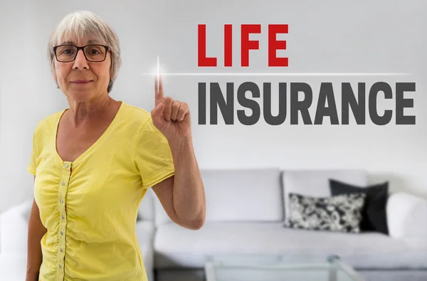 Life Insurance touchscreen is shown by Senior Woman — Stock Photo, Image