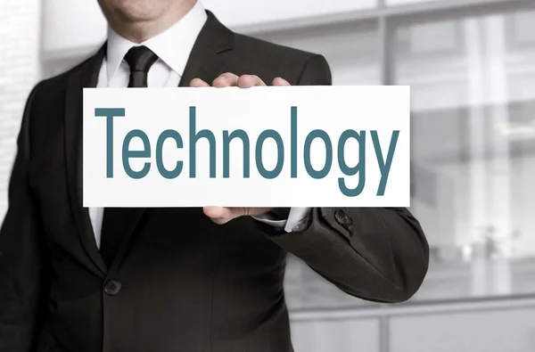 Technology sign is held by businessman — Stock Photo, Image