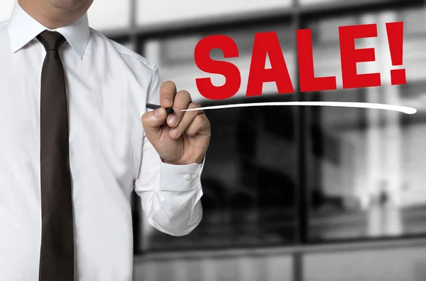 Sale is written by businessman background — Stock Photo, Image