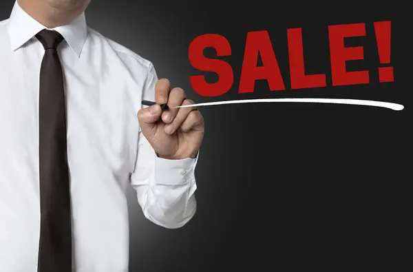 Sale is written by businessman background — Stock Photo, Image