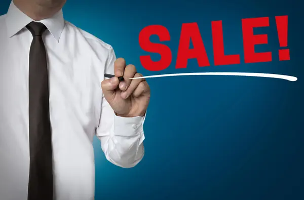 Sale is written by businessman background — Stock Photo, Image