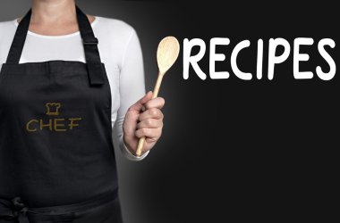 Tahta kaşık arka planda tutan tarifler uydurmak