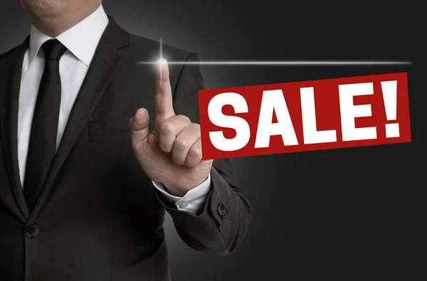 Sale touchscreen is operated by businessman concept — Stock Photo, Image