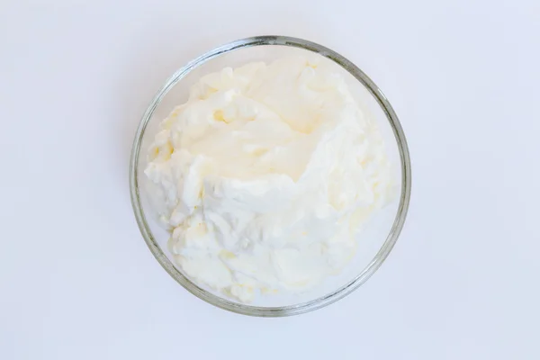 Cream isolated in a glass bowl — Stock Photo, Image