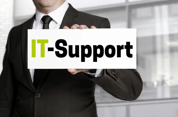 IT support sign is held by businessman concept — Stock Photo, Image