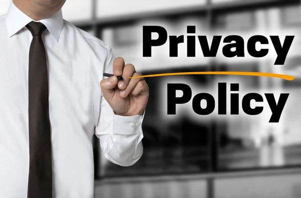Privacy Policy är skriven av affärsmannen bakgrund koncept — Stockfoto