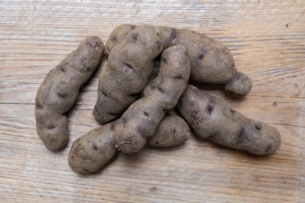 Batatas em madeira rústica Conceito — Fotografia de Stock