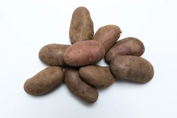 Batatas no conceito de fundo branco — Fotografia de Stock