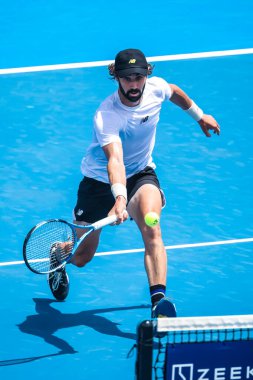 MELBOURNE, AUSTRALIA - 14 Ocak 2026: Avustralyalı Jordan Thompson, 14 Ocak 2026 tarihinde Melbourne, Avustralya 'da Kanadalı Denis Shapovalov ile oynamaktadır..