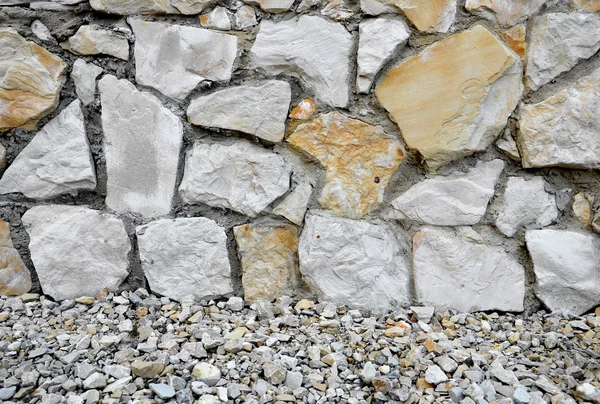 Bakgrund av ljusa stenmur mosaik konsistens — Stockfoto