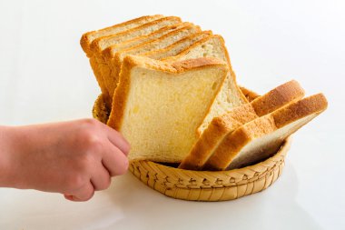 Child taking a piece of bread clipart