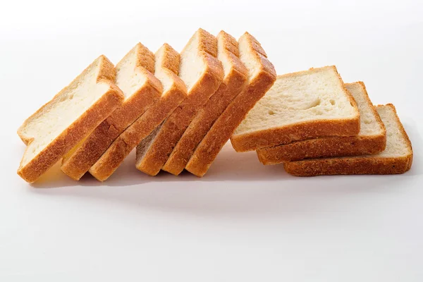 Sliced bread on white background — Stock Photo, Image