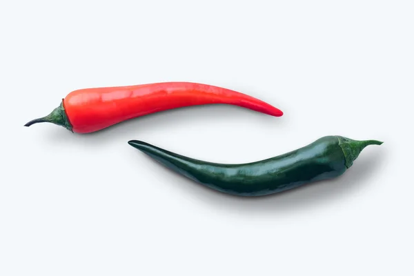 Červené a zelené hot chili pepper — Stock fotografie