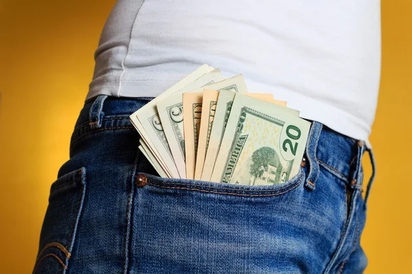 Dollars in jeans pocket — Stock Photo, Image