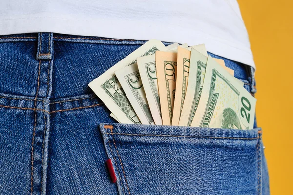 Money in pocket, rear view — Stock Photo, Image