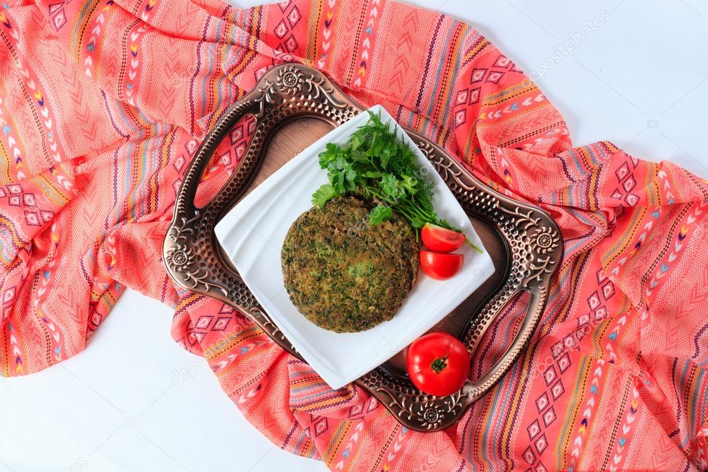 Omelette with herbs, traditional Azerbaijani cuisine. Top view.