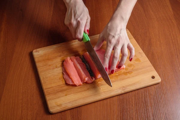 Cook separates fish fillet — Stock Photo, Image