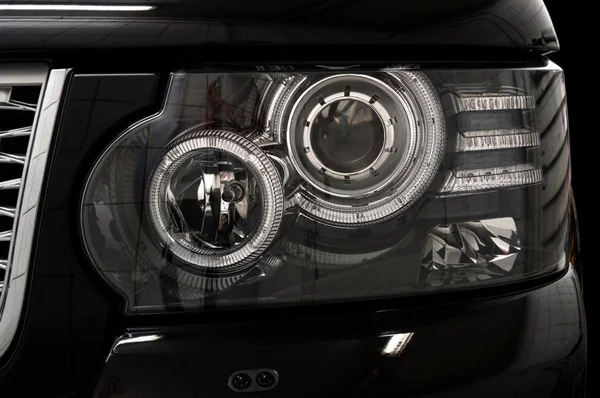 Black car headlights. — Stock Photo, Image