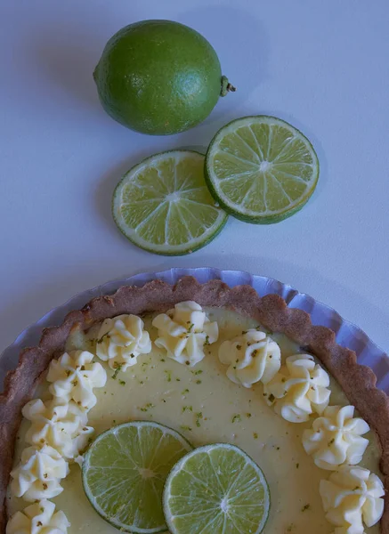 key lime pie. lime pie and whipped cream with sable dough