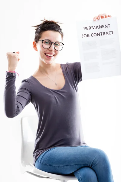 exulting woman holding her job contract