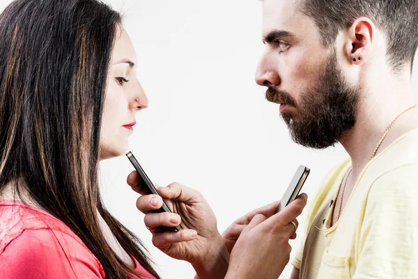 Mulher homem e telefones inteligentes — Fotografia de Stock