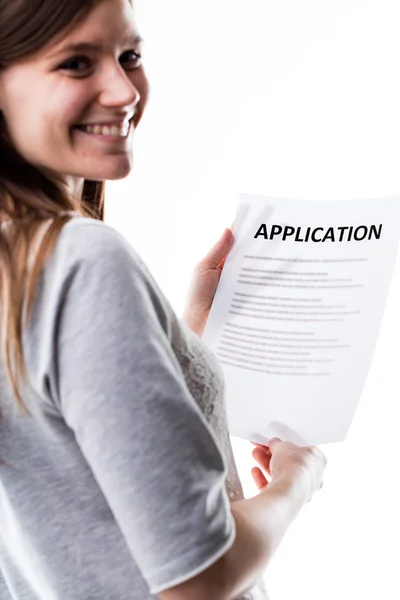 Portrait of a young woman with an application — Stock Photo, Image