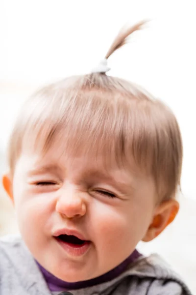 Little girl sneeze or funny face — Stock Photo, Image