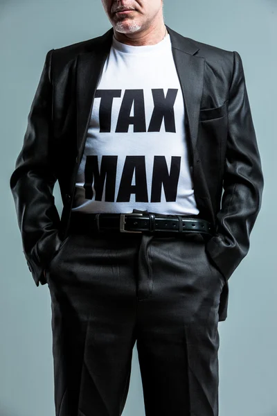 Stern man wearing a Tax Man t-shirt — Stock Photo, Image