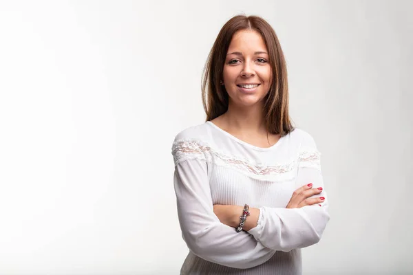 Confident Young Woman Folded Arms Sweet Quiet Smile Studio Portrait — Stockfoto