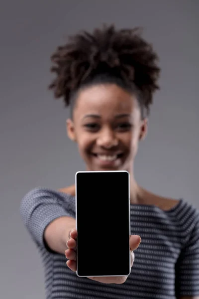 Happy Young Black Woman Extending Her Blank Mobile Phone Camera — Stock Photo, Image