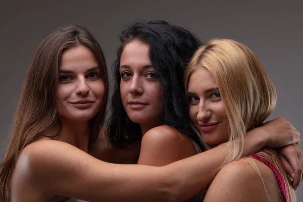 Three Attractive Friendly Young Women Posing Close Embrace Smiling Camera — Stock Photo, Image