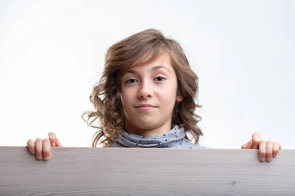 Young Girl Looking Top Wooden Board Quiet Smile Thoughtful Expression — Stock Photo, Image
