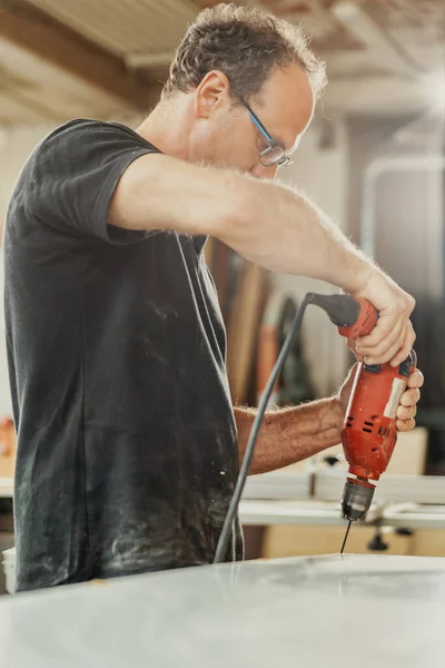 Carpenter Drilling Hole Large Panel Wood Using Hand Held Red — Stock Photo, Image