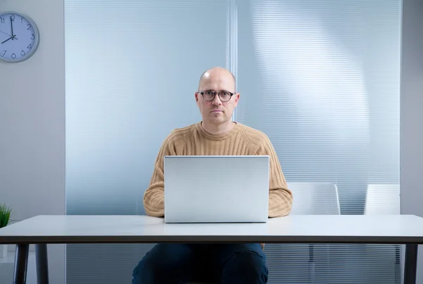 Hipster nerd bald with laptop — Stock Photo, Image