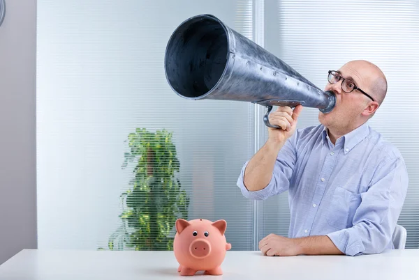 Man megaphone and pig mean savings — Stock Photo, Image
