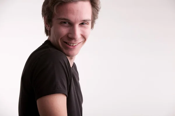 Young beautiful man striking a pose — Stock Photo, Image